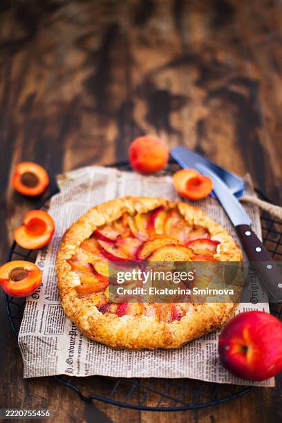peach rustic open pie (galette) - galette stock pictures, royalty-free photos & images