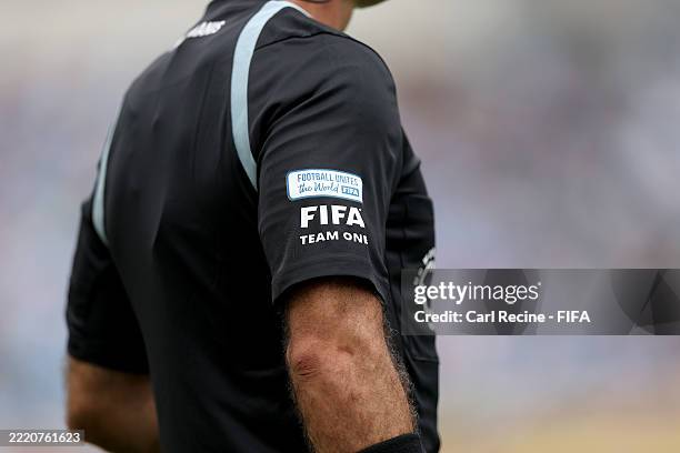 Detailed view of a 'Football Unites The World' patch on a referee during the FIFA Club World Cup 2025 group G match between Manchester City FC and...
