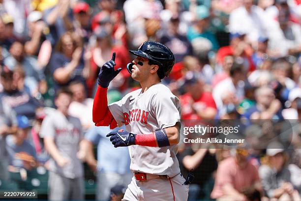Marcelo Mayer of the Boston Red Sox gestures after hitting a solo home run during the second inning against the Seattle Mariners at T-Mobile Park on...