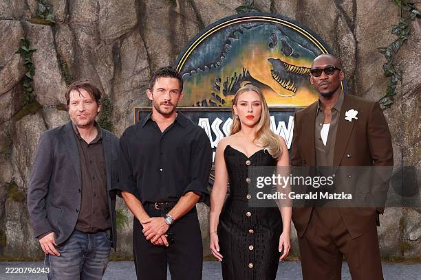 Director Gareth Edwards, Jonathan Bailey, Scarlett Johansson and Mahershala Ali attend the Berlin premiere of the movie "Jurassic World Rebirth" at...