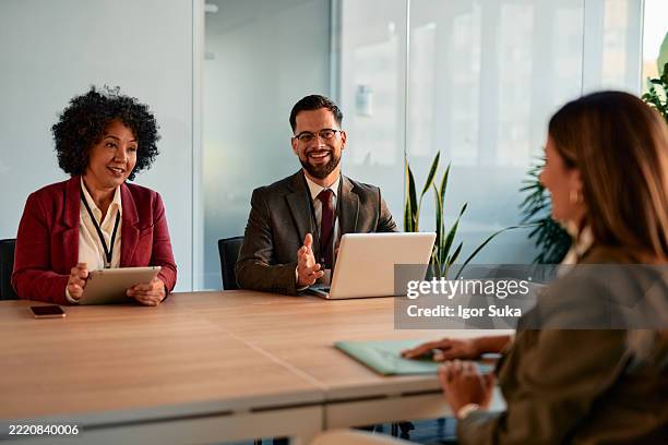 human resources managers interviewing a candidate for a job position - choosing stock pictures, royalty-free photos & images