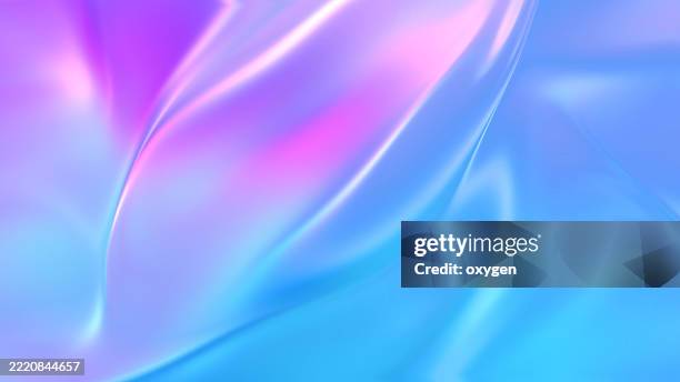 soft iridescent silk texture in blue and pink. smooth, flowing abstract background with silky textures in pastel blue, pink, and purple tones. - couleur irisée photos et images de collection
