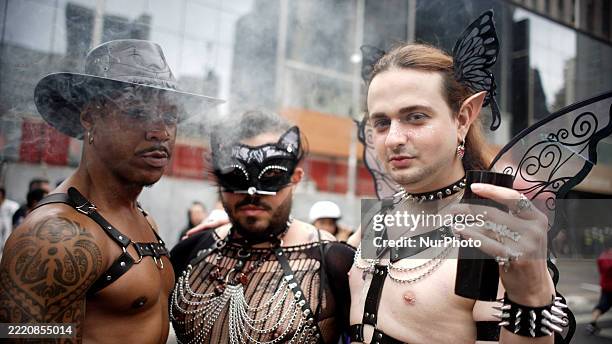 Revelers pose for a picture during the 29th LGBT Pride Parade in Sao Paulo, Brazil, on June 22, 2025.