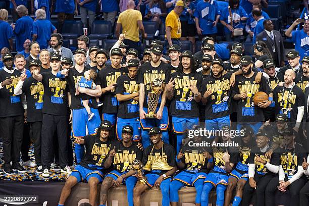 Oklahoma City, Oklahoma Oklahoma City Thunder players celebrate with the Larry O'Brien trophy after winning Game Seven of the 2025 NBA Finals against...