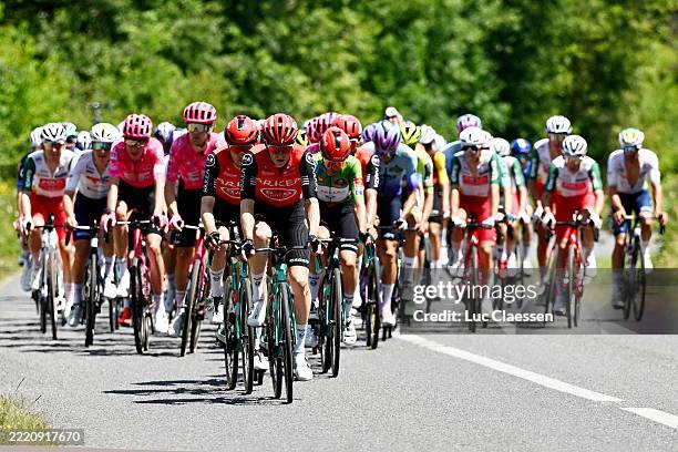 Simon Guglielmi of France and Raul Garcia Pierna of Spain and Team Arkea - B&B Hotels - Red Leader Jersey lead the peloton during the 48th La Route...