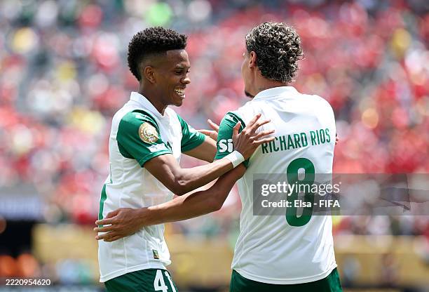 Estevao and Richard Rios of Palmeiras celebrate after Wessam Abou Ali of Al Ahly FC scores a own goal and Palmeiras first during the FIFA Club World...