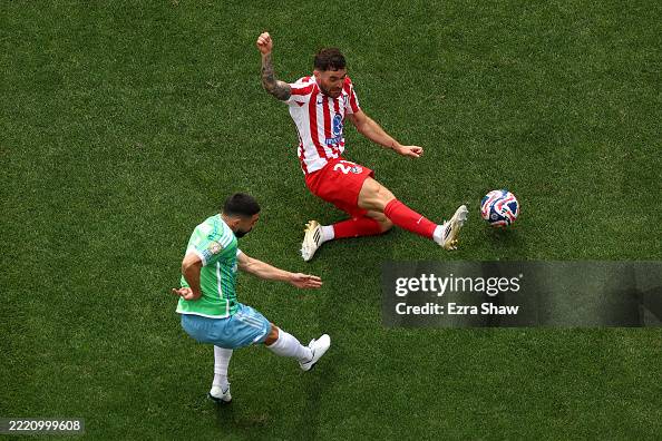 Christian Roldan Cristian Roldan of Seattle Sounders FC crosses the ball under... News ...