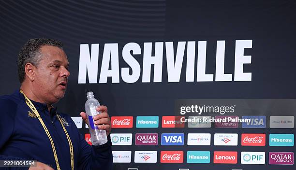 Maher Kanzari Manager of Esperance de Tunis during the Press Conference drinks water ahead of their FIFA Club World Cup 2025 match between Los...