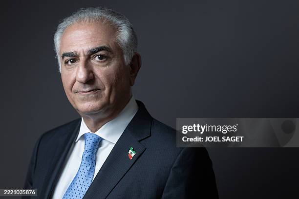Iran's former crown prince and now key opposition figure Reza Pahlavi poses during a session photo after a press conference in Paris on June 23, 2025.