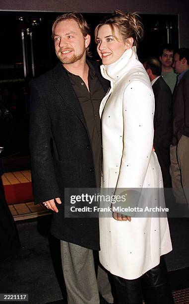 Kate Winslet and husband Jim Threapleton at the New York premiere of Jane Campion's HOLY SMOKE by Miramax films, 1/10/00.