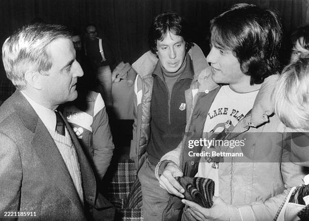 Vice President Walter Mondale chats with Olympic individual star Eric Heiden. Mondale flew to the Olympic arena to watch the U.S. Team win the...