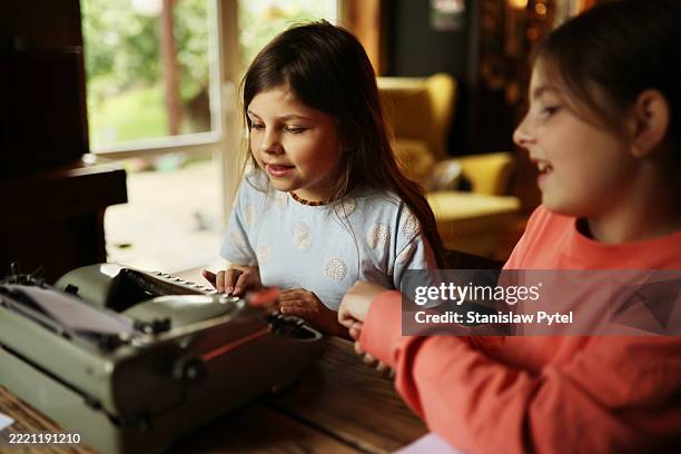 Girl Using Typewriter 314 Typewriter Girl Stock Photos, High-Res Pictures, and Images - Getty ...