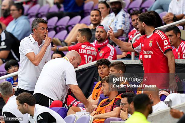 Bruno Lage , Head Coach of SL Benfica, argues with Orkun Koekcu of SL Benfica on the bench after Koekcu was shown a yellow card during the FIFA Club...