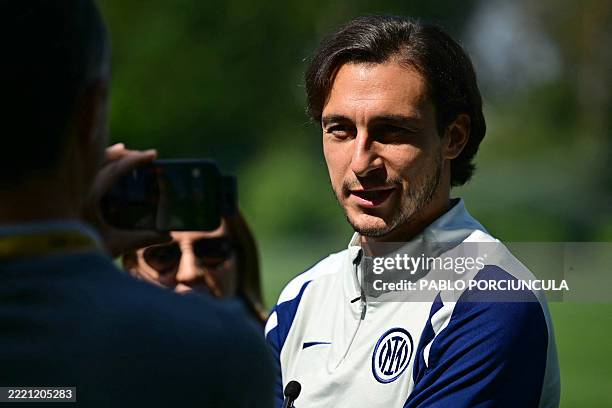 Inter Milan's Italian defender Matteo Darmian talks to journalist during a mixed zone before a training session at Virginia Mason Athletic Center in...