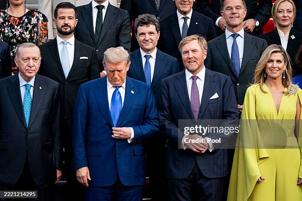 President Donald Trump and NATO leaders join King Willem-Alexander and Queen Máxima of the Netherlands for a family photo as they participate in the...