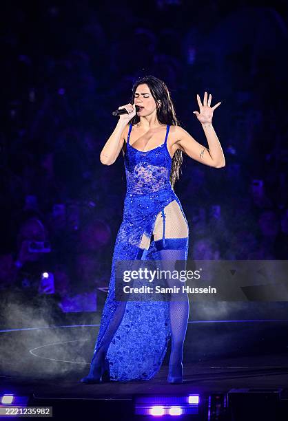 Dua Lipa performs on stage during her "Radical Optimism" tour at Wembley Stadium on June 20, 2025 in London, England.