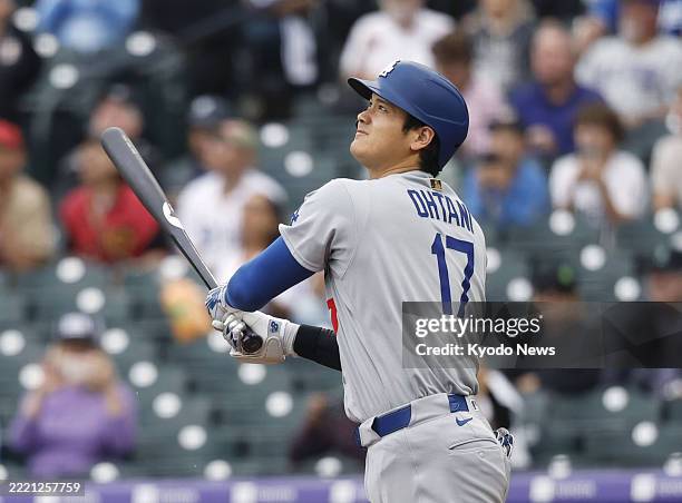 Los Angeles Dodgers designated hitter Shohei Ohtani flies out in the first inning of a baseball game against the Colorado Rockies at Coors Field in...