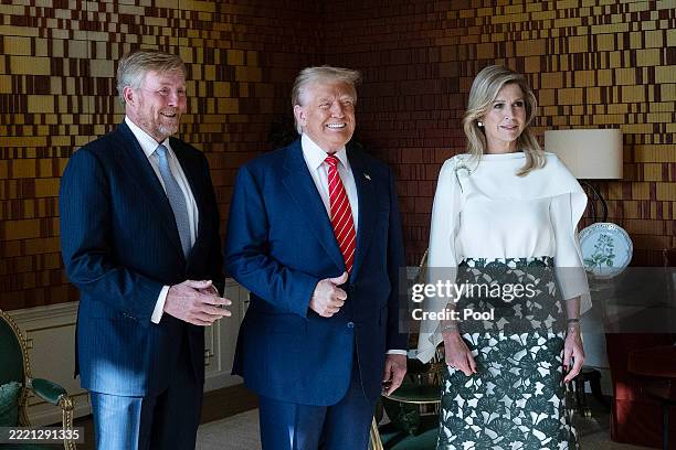 President Donald Trump poses with King Willem-Alexander of the Netherlands and Queen Maxima at Paleis Huis ten Bosch on the sidelines of the NATO...