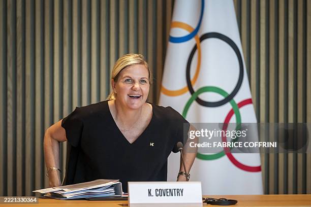 President of the International Olympic Committee Kirsty Coventry smiles seating or her first meeting of the International Olympic Committee executive...