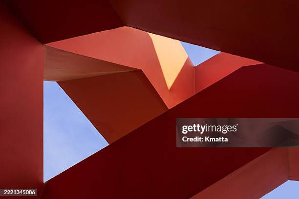 red abstract buildings and 3d rendering of buildings. - architectonisch element stockfoto's en -beelden