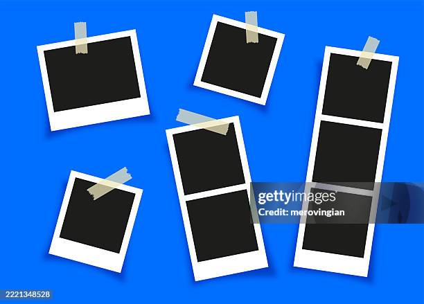photo frame collection with sticky tapes on blue background - instant print transfer stock illustrations