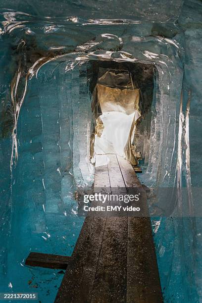inside the rapidly melting rhone glacier - retreating stock pictures, royalty-free photos & images