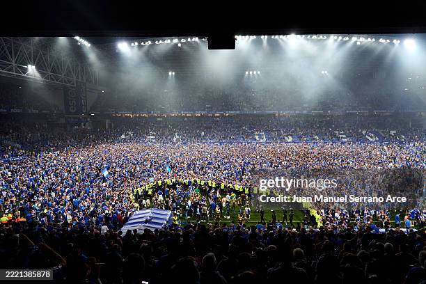 Fans of Real Oviedo over the pitch celebrating their team's victory and promotion to LaLiga EA Sports after the LaLiga Hypermotion Play Off FInal 2nd...