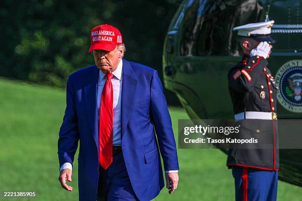 Saturday Trump U.S. President Donald Trump walks on the south lawn of the White ...