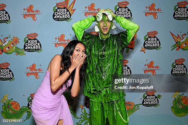 Casie Baker and mgk attend the Nickelodeon Kids' Choice Awards 2025 at Barker Hangar on June 21, 2025 in Santa Monica, California.