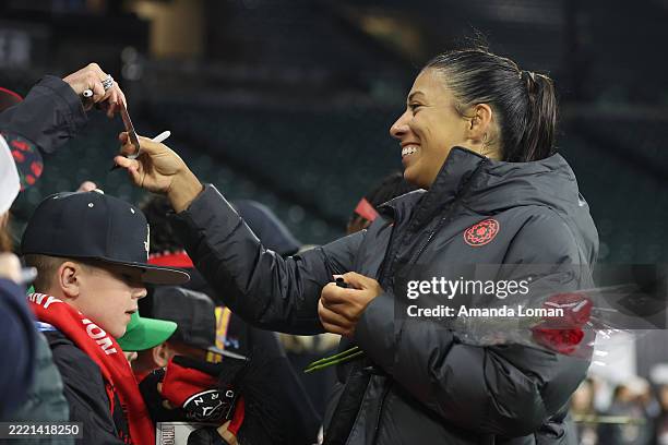 Reya Reyes Reyna Reyes of Portland Thorns FC signs an autograph after the NWSL ...