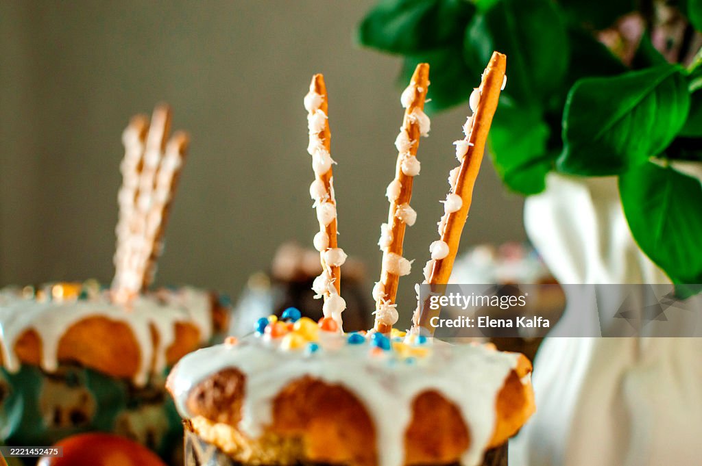 Easter. Traditional Easter cake, painted eggs, pussy willow, lilac.