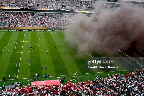 General view of a stoppage in play due to flares lit by Wydad AC fans following their team's first goal during the FIFA Club World Cup 2025 group G...