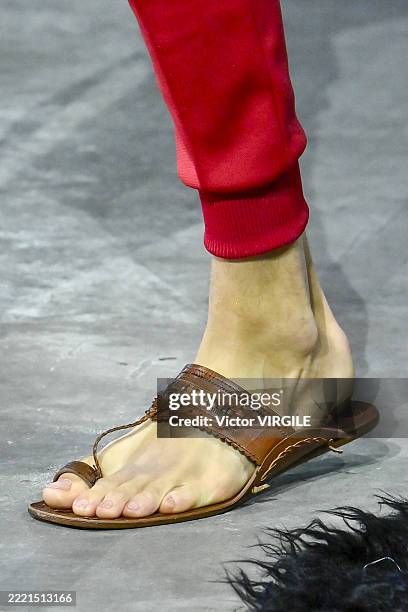 Model walks the runway during the Prada Ready to Wear Spring/Summer 2026 fashion show as part of the Milan Men Fashion Week on June 22, 2025 in...