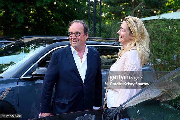 François Hollande and Julie Gayet attend the Festiv4L Signé Renault at Chalet des Iles on June 22, 2025 in Paris, France.
