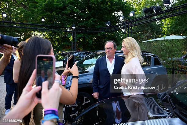 François Hollande and Julie Gayet attend the Festiv4L Signé Renault at Chalet des Iles on June 22, 2025 in Paris, France.