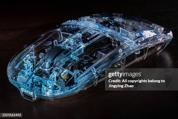 close up of a transparent shell mouse - bluetooth mouse stock pictures, royalty-free photos & images