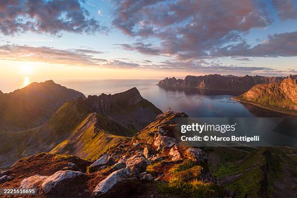 wild coast scenery during midnight sun, senja island, norway - scandinavia stock pictures, royalty-free photos & images