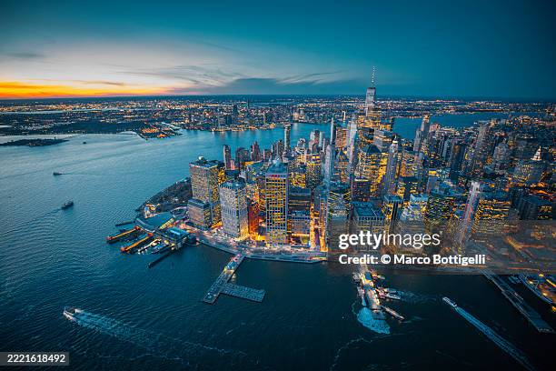aerial view of lower manhattan at dusk, new york city - lower manhattan stock-fotos und bilder