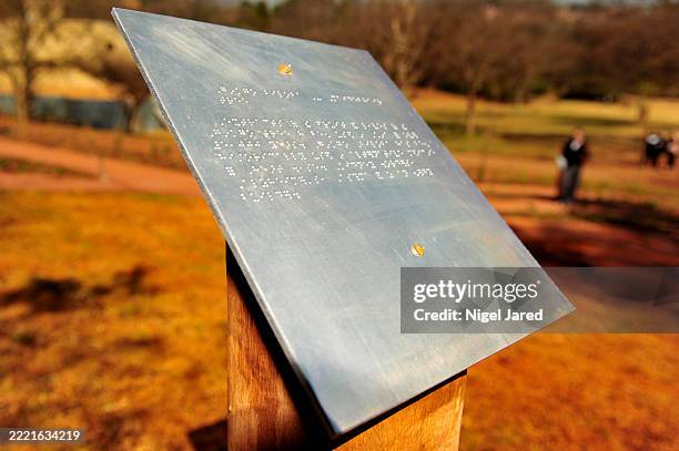 braille sign at medicinal garden. - braille stock pictures, royalty-free photos & images