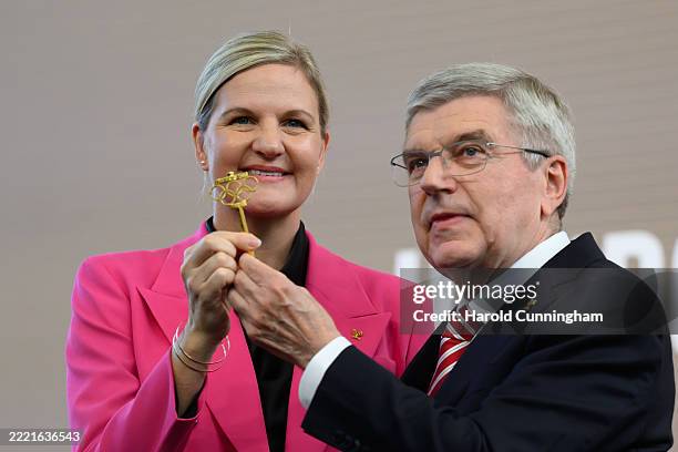 International Olympic Committee President Kirsty Coventry is handed the Olympic key from outgoing International Olympic Committee President Thomas...