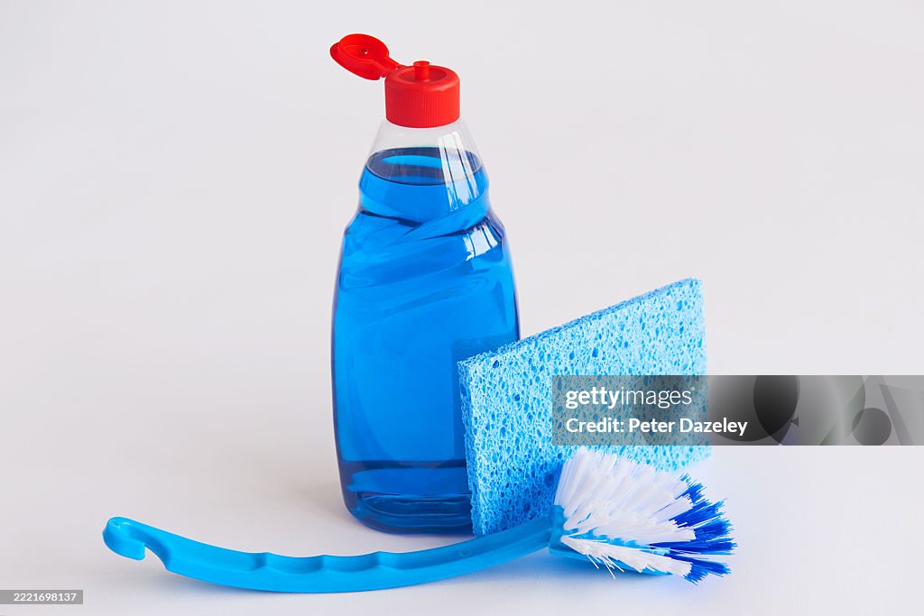 Washing up liquid with washing up brush