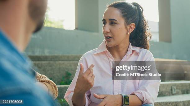 diverse group people participating in outdoor community therapy session focused on mental health awareness and support sharing advice to promote empathy togetherness. mental health concept. - participant stock pictures, royalty-free photos & images