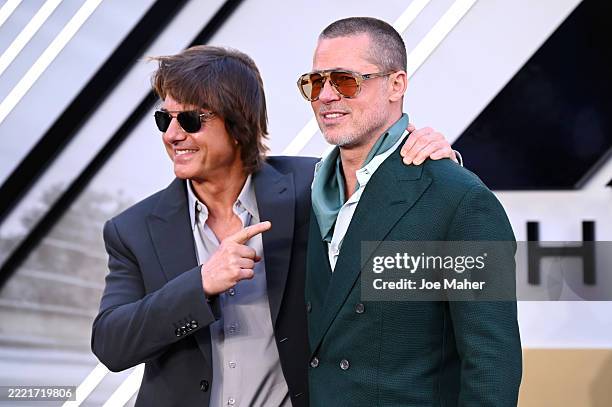 Tom Cruise and Brad Pitt attend the "F1: The Movie" European Premiere at Cineworld Leicester Square on June 23, 2025 in London, England.