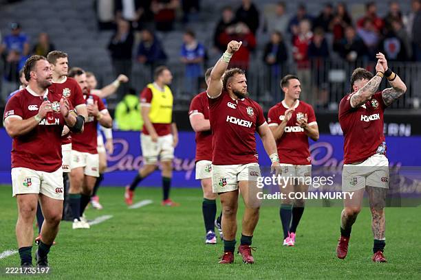 Players from the British and Irish Lions react towards their supporters after their rugby game against the Western Force at Optus Stadium in Perth on...