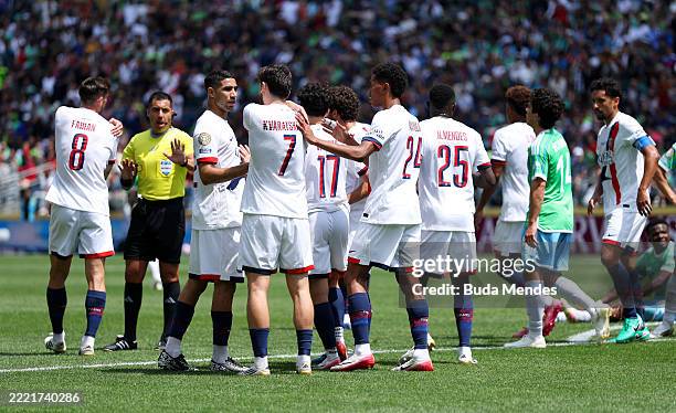 Khvicha Kvaratskhelia of Paris Saint-Germain celebrates scoring his team's first goal with teammates during the FIFA Club World Cup 2025 group B...