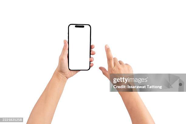 a person is holding a cell phone with a white background - smart phone stock pictures, royalty-free photos & images