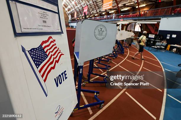 People vote in the mayoral primary election at the Park Slope Armory YMCA on June 24, 2025 in the Brooklyn borough of New York City. The latest polls...