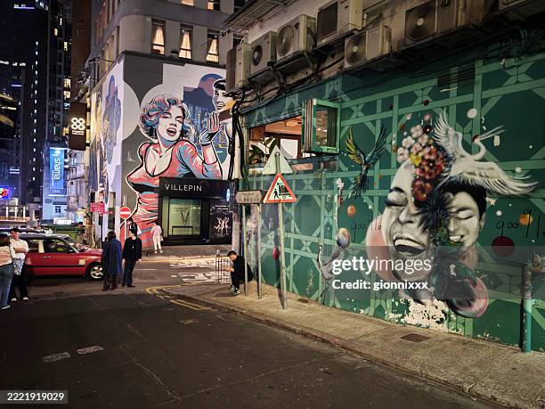 people in soho at night, hong kong - hong kong island stock pictures, royalty-free photos & images