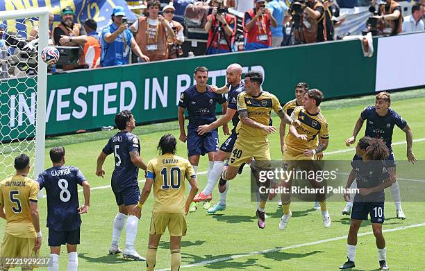 Lautaro Di Lollo of CA Boca Juniors scores his team's first goal by an own goal from Nathan Garrow of Auckland City FC during the FIFA Club World Cup...