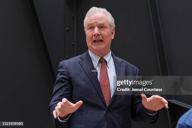Sen. Chris Van Hollen addresses fired federal workers and their families at the Hart Senate Office Building prior to a sit-in pose at the Dirksen...
